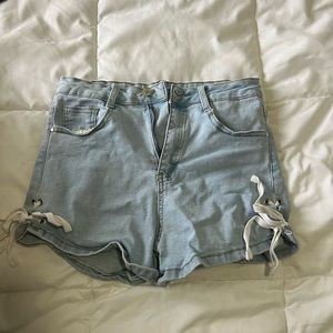 Shein stretchy denim shorts with string detail on sides